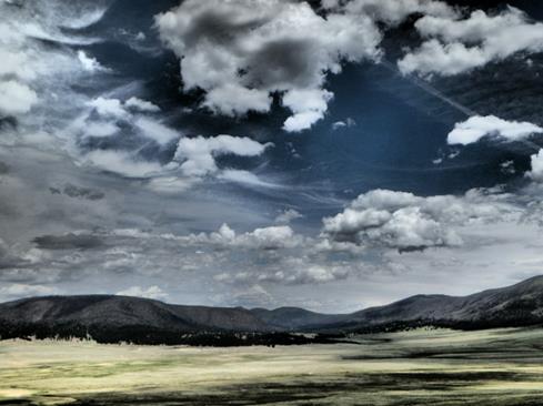 Desert clouds shot with the Olympus TG-850's Dramatic Tone filter.