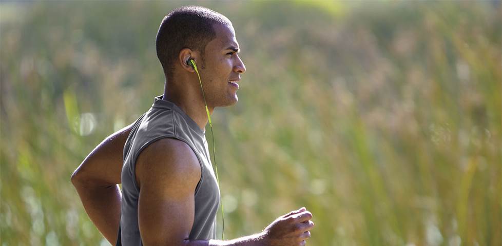 Man running with Bose headphones