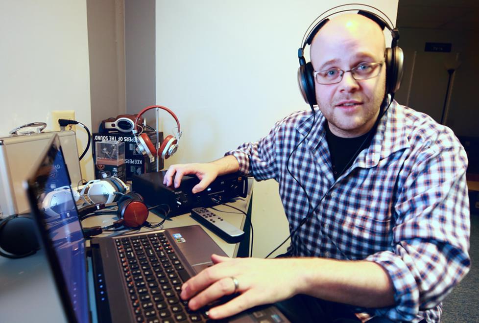 Testing out headphones in the Crutchfield Labs