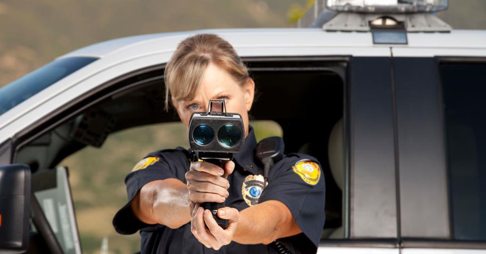 Police officer with laser gun