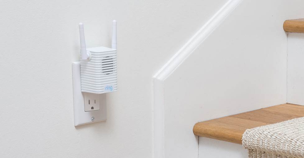 Ring Chime Pro plugged into a wall outlet near a stairway