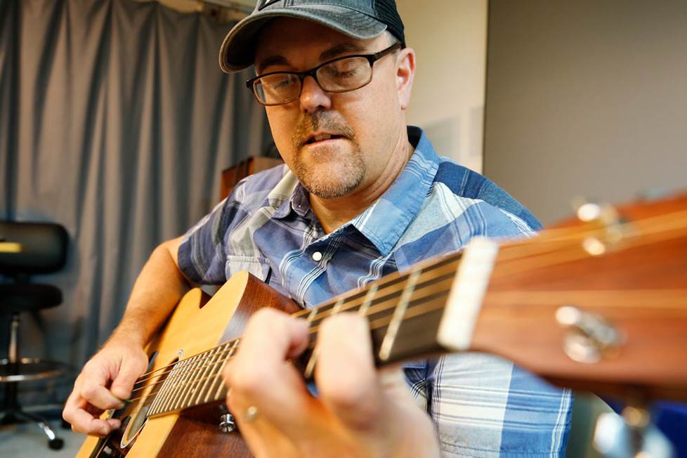 Rex with guitar