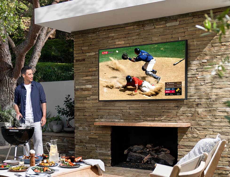 Man watches a Samsung outdoor TV