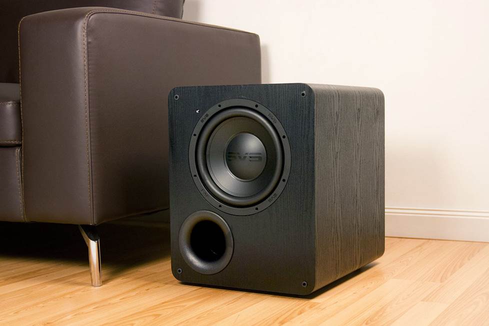 SVS subwoofer next to couch
