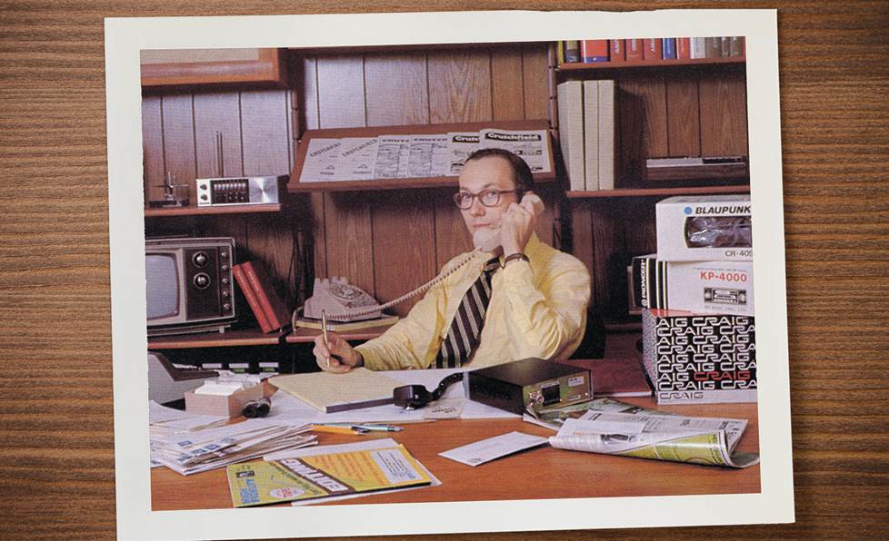 Photo print on wood surface showing Bill Crutchfield in his office circa 1975