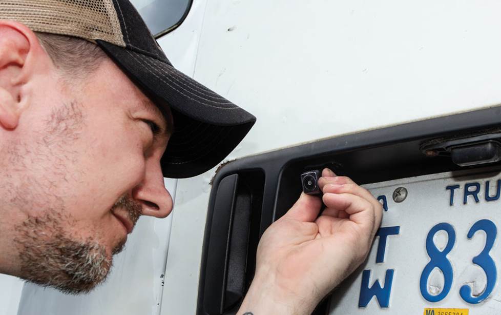 Blue installing backup cam
