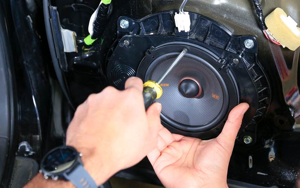 Carlos installing speaker