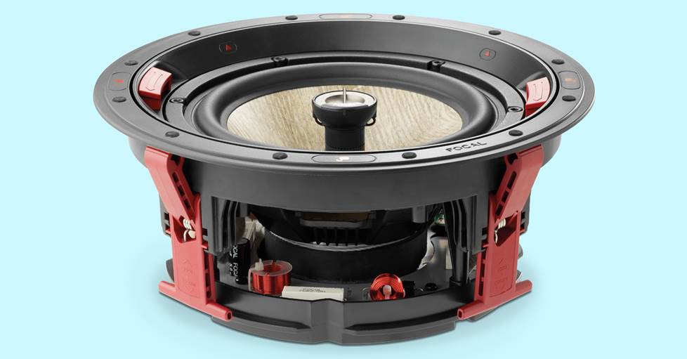An in-ceiling speaker on a light blue background.