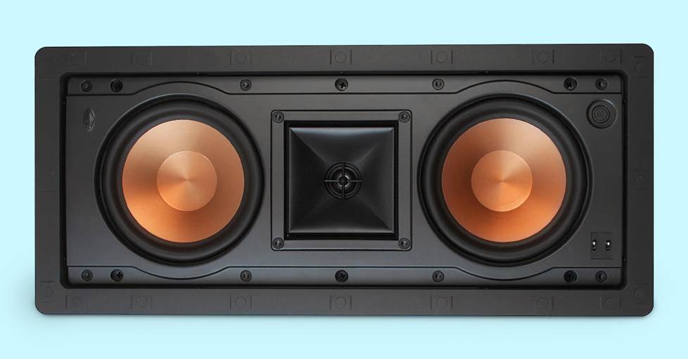 An in-wall speaker on a blue background.