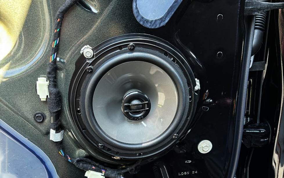JL Audio C2-650x 6-1/2" 2-way speaker shown in rear door of 2024 Ford F-150
