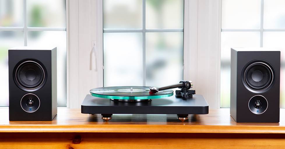 speaker on shelf with turntable