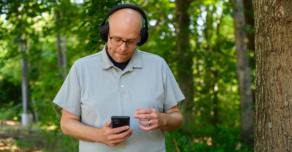 Jeff wearing Sony XM6 headphones