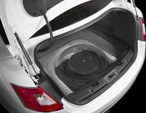 fits in tire well of 2010-up Ford Taurus