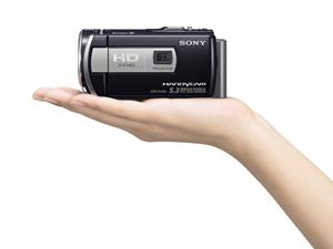 The Sony Handycam® HDR-PJ200 in hand for scale