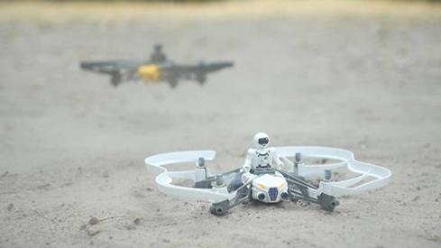 The Parrot Mars Minidrone can carry cargo, like the included mini-figure.
