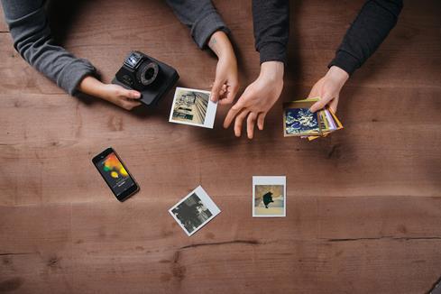 Point, shoot, and print photos of unforgettable moments with the Impossible I-1 instant camera.
