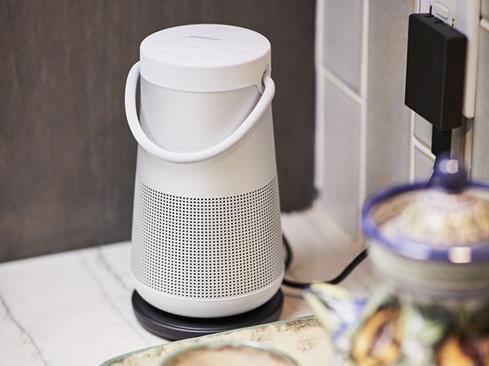 Bose Soundlink Reolve Bluetooth speaker and charging cradle