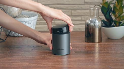 The versatile Samsung SNA-R1100W features a rotating wireless hub with removable camera.