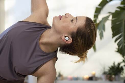 Woman wearing Google Pixel Buds