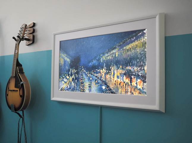 Meural Canvas mounted on wall