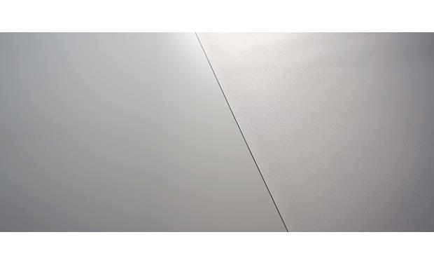 Screen Innovations 5 Series SI's Micro Texture surface (left) is 9X finer and smoother than the typical screen surface