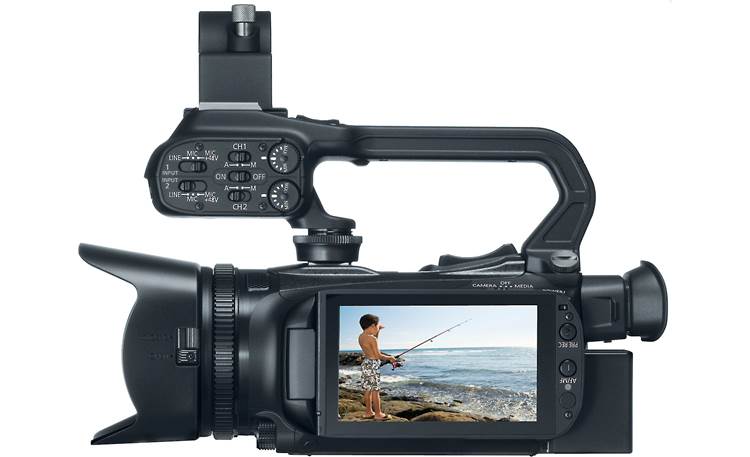 Canon XA25 Left side view, with LCD touchscreen rotated outward for monitoring and handle attached