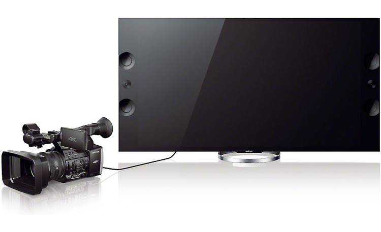 Sony Handycam®  FDR-AX1 Shown attached to a TV (not included)