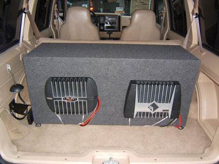 Amplifiers mounted on subwoofer box