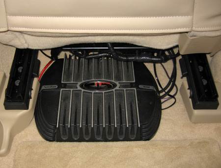 Rockford Fosgate Punch 400S amp under the passenger front seat.