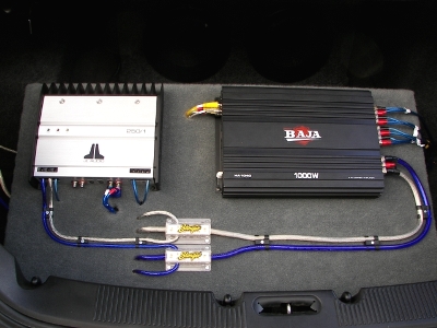 Profile & JL Audio Amplifiers Mounted on Rack in Trunk