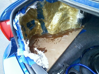 fiberglass molded to the inside of the trunk