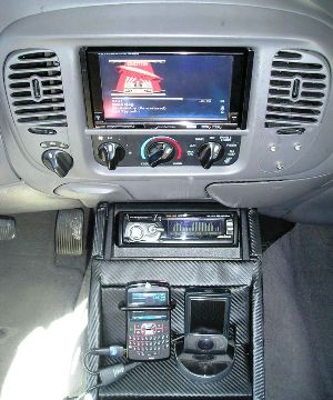 IVA-W205 with console containing the HDA-5460, Zune30 dock and phone holder