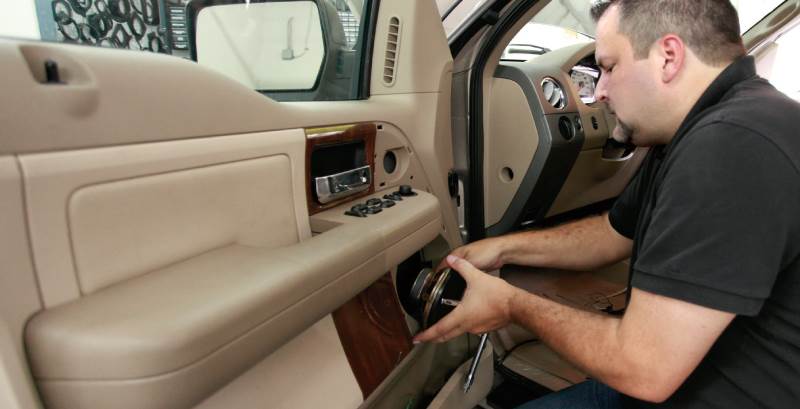 Jeff installing speakers in his F-150