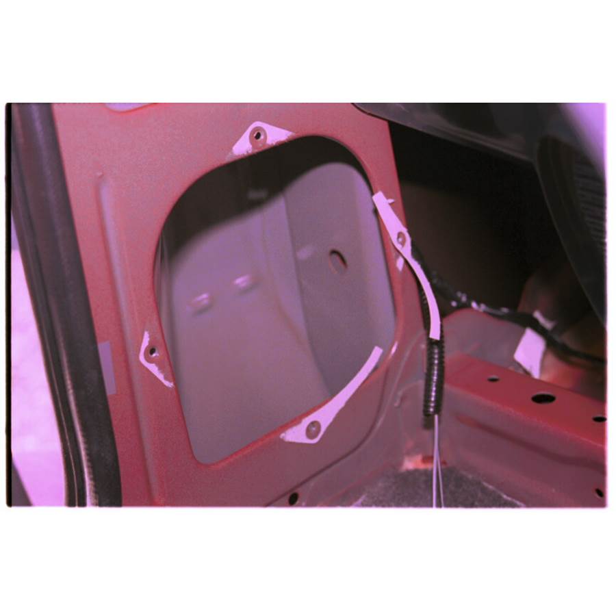 2000 Chevrolet Metro Rear side panel speaker removed