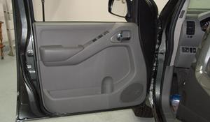 2009 Nissan Frontier XE Front door speaker location