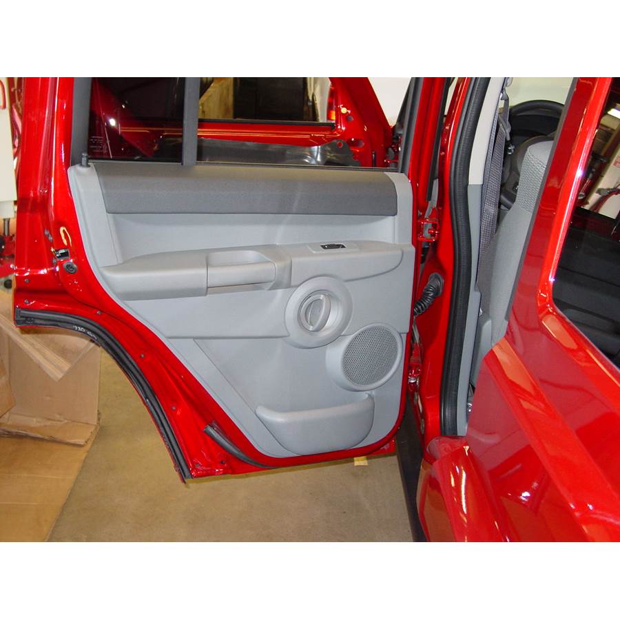 2009 Jeep Commander Rear door speaker location