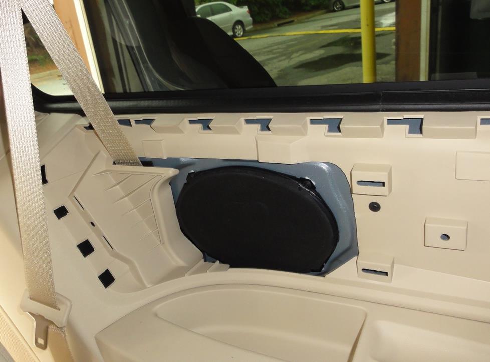 Rear side panel speakers on a Chrysler Town & Country