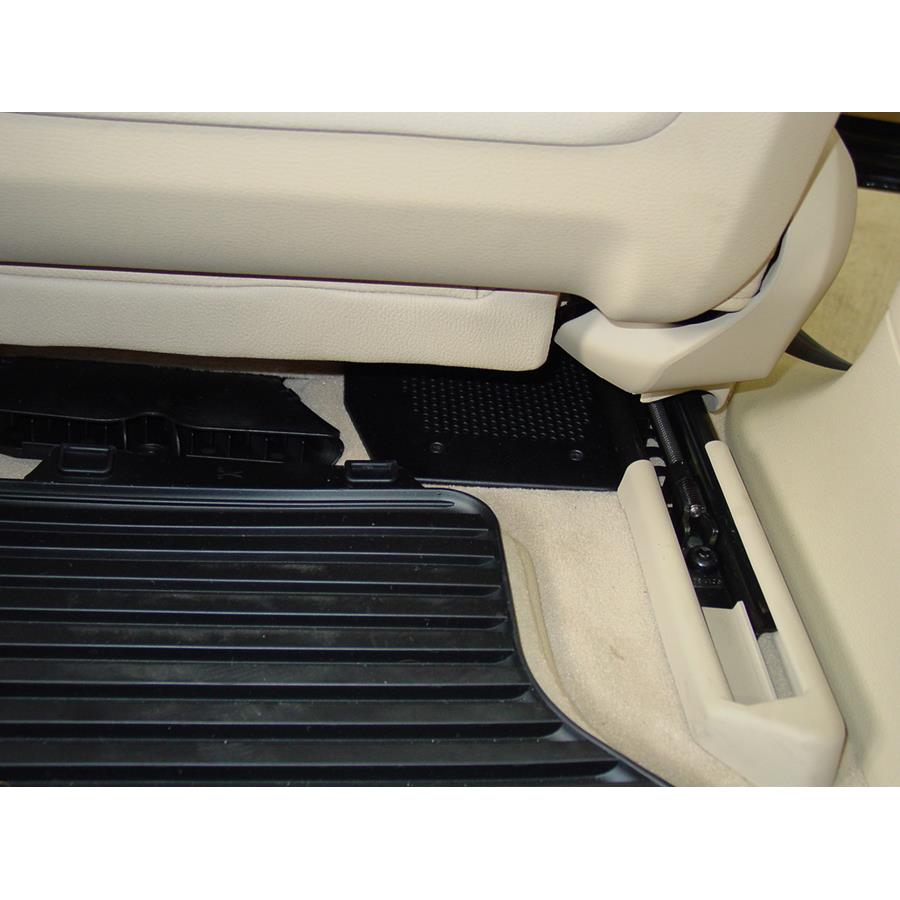 2011 BMW X5 Under front seat speaker location