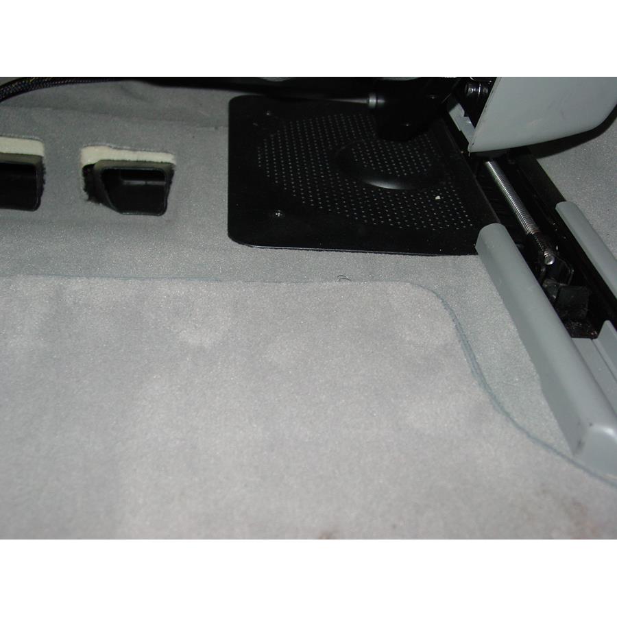 2010 BMW 5 Series Under front seat speaker location