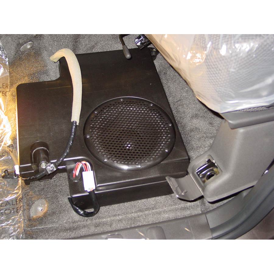 2009 Nissan Xterra Under front seat speaker