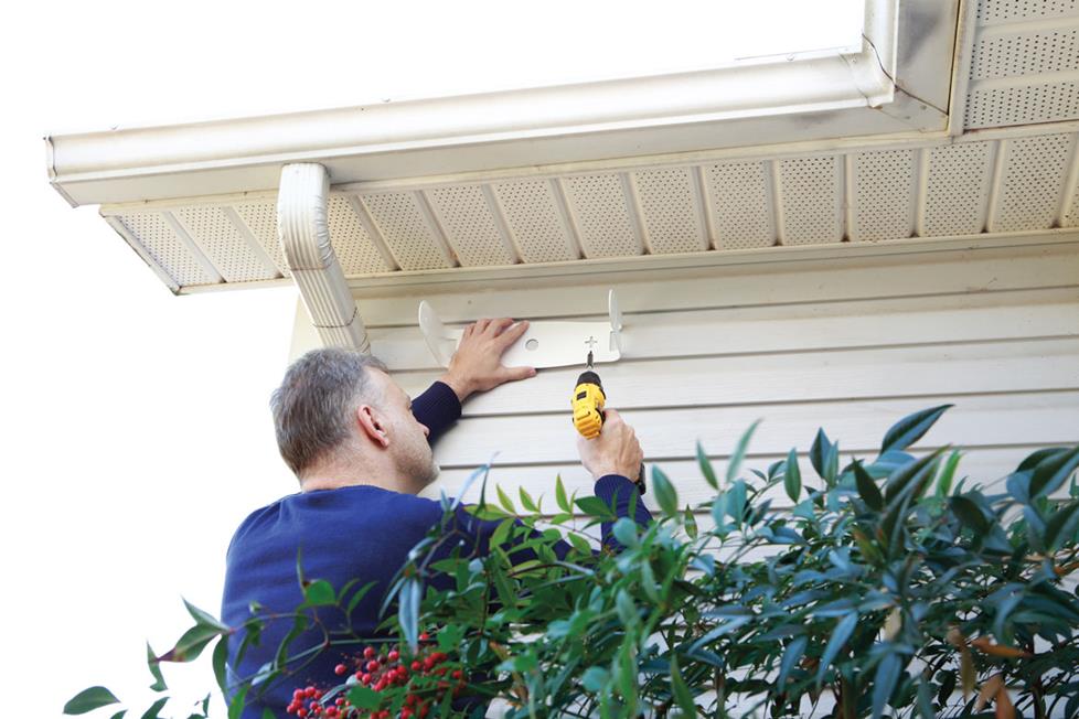 mounting outdoor speakers under eaves