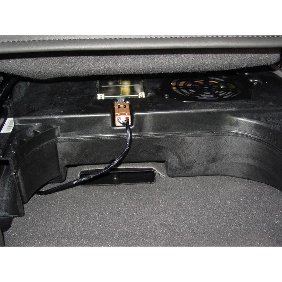 2005 Nissan Armada Under front seat speaker location