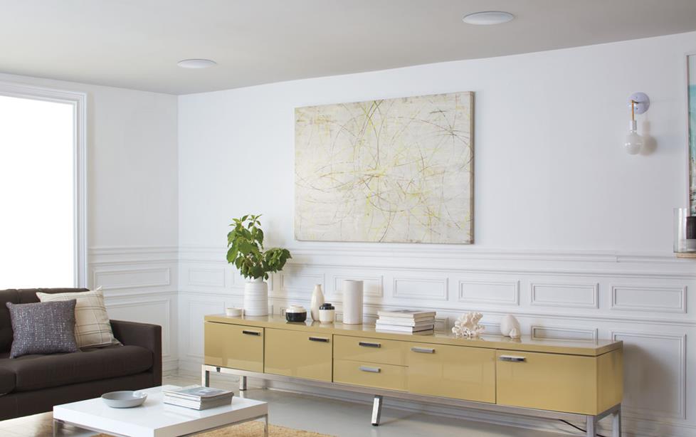 Living room with in-ceiling speakers.