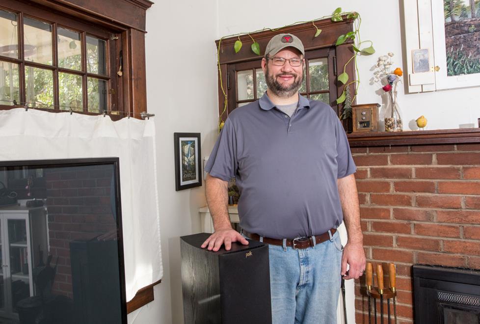 Josh Crane with his Polk Audio TSx550T floor-standing speakers