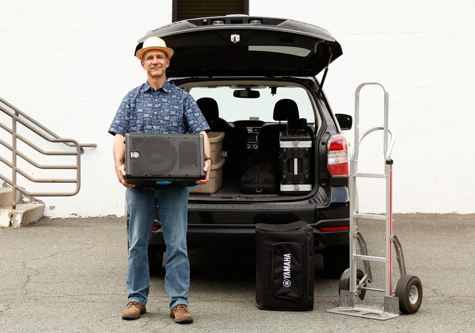The author loading PA gear in his vehicle