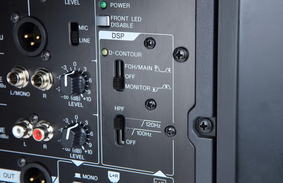 close up on controls on back of powered PA speaker