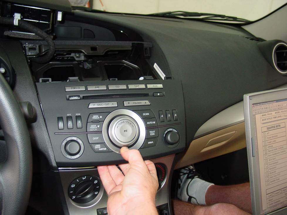 mazda 3 factory radio removal