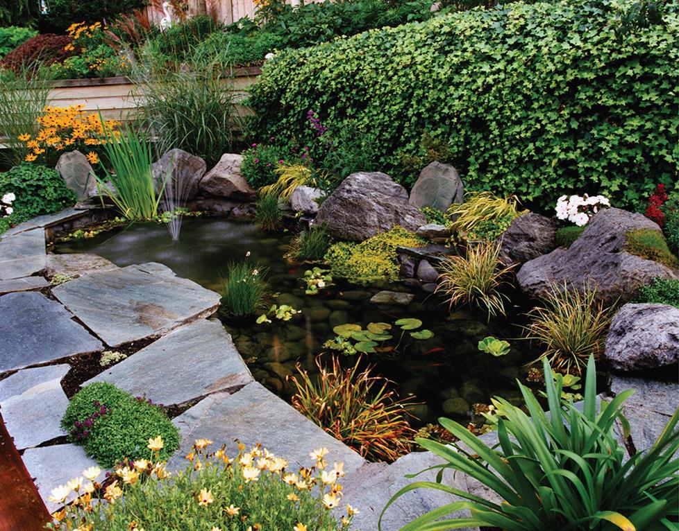 Rock speakers in landscaping