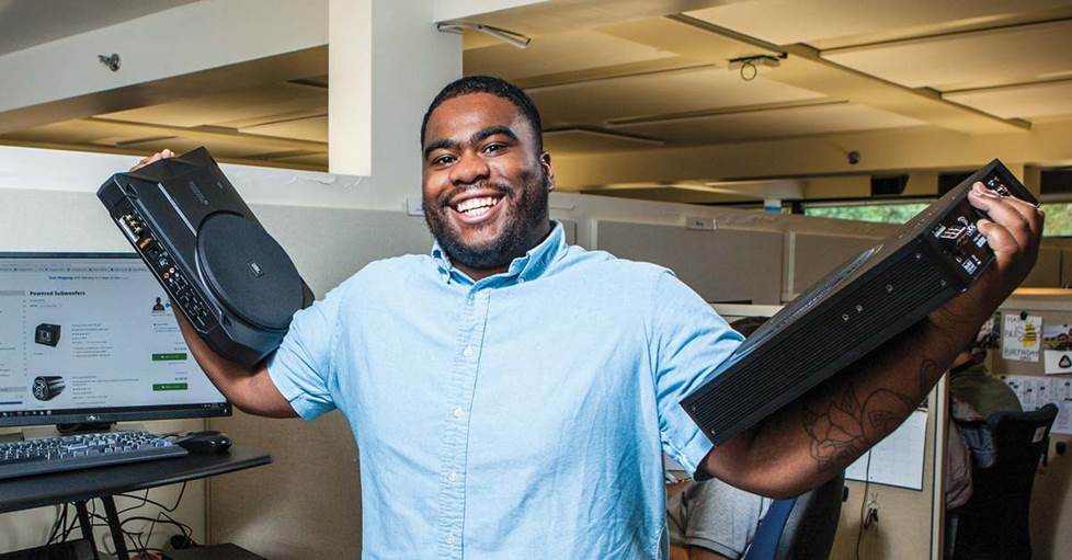 Cam at his desk with the Focal and JBL compact powered subwoofers.