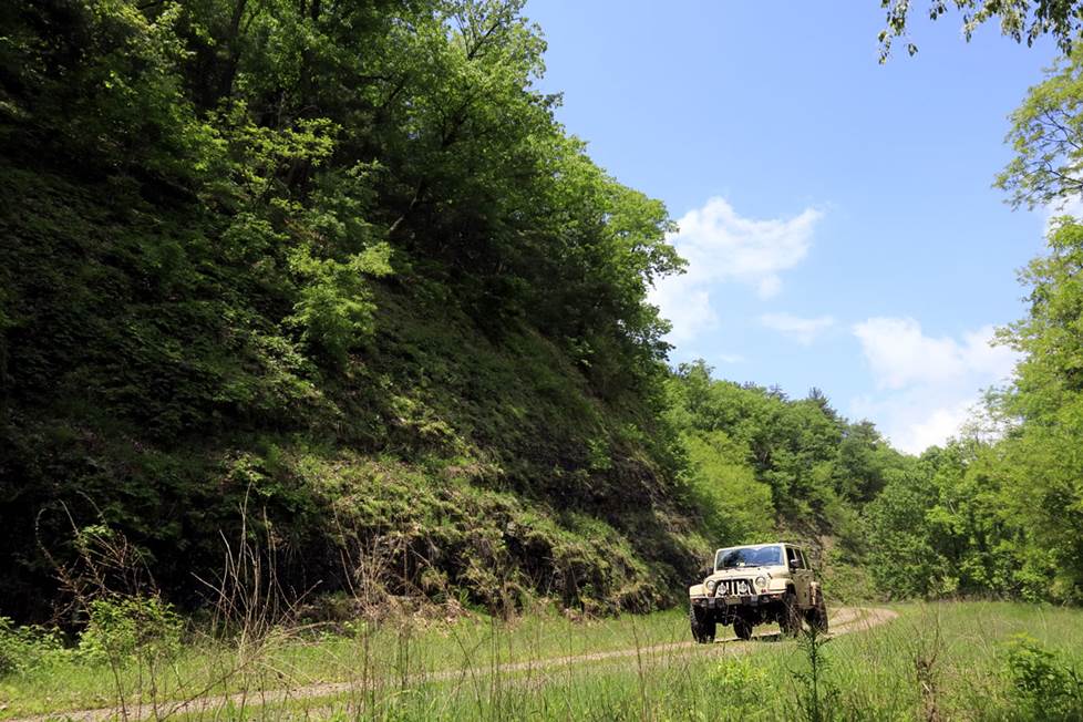 Vehicle driving on the trail.